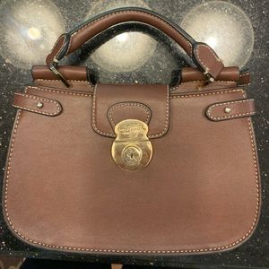 Brown bag with small handle.